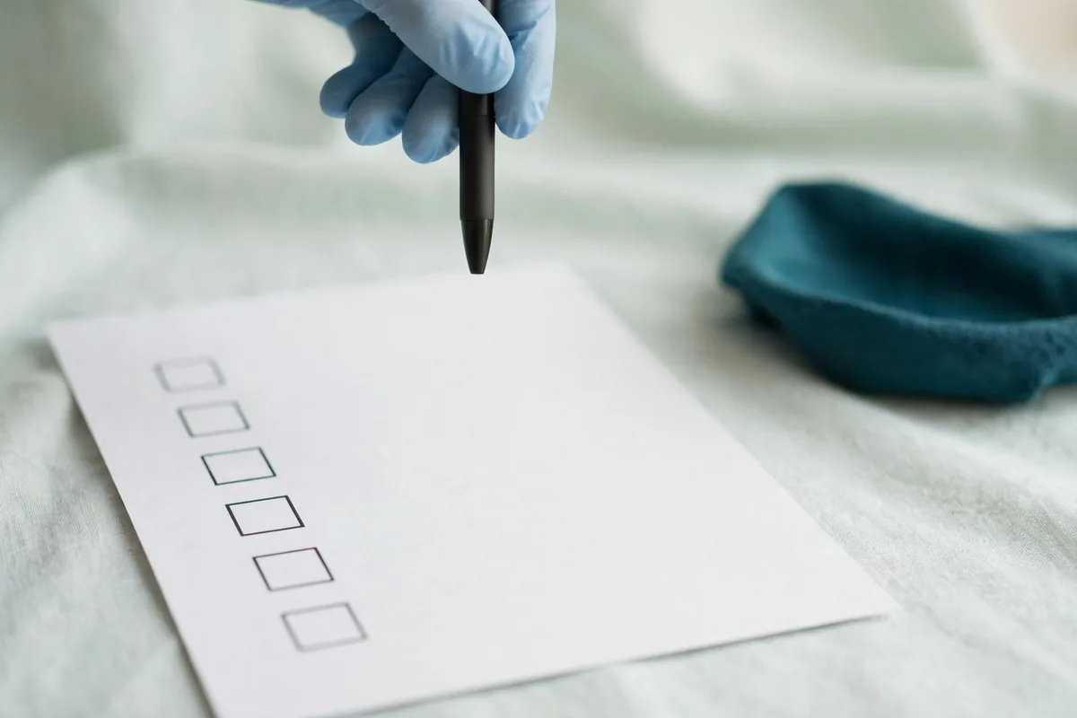 A pen over a checklist